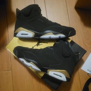Jordan Black and Gold Athletic Shoes
